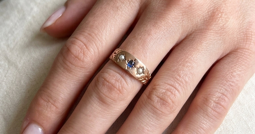 hand A pretty 15 carat gold Victorian dress ring. Hallmarks for Chester 1892.