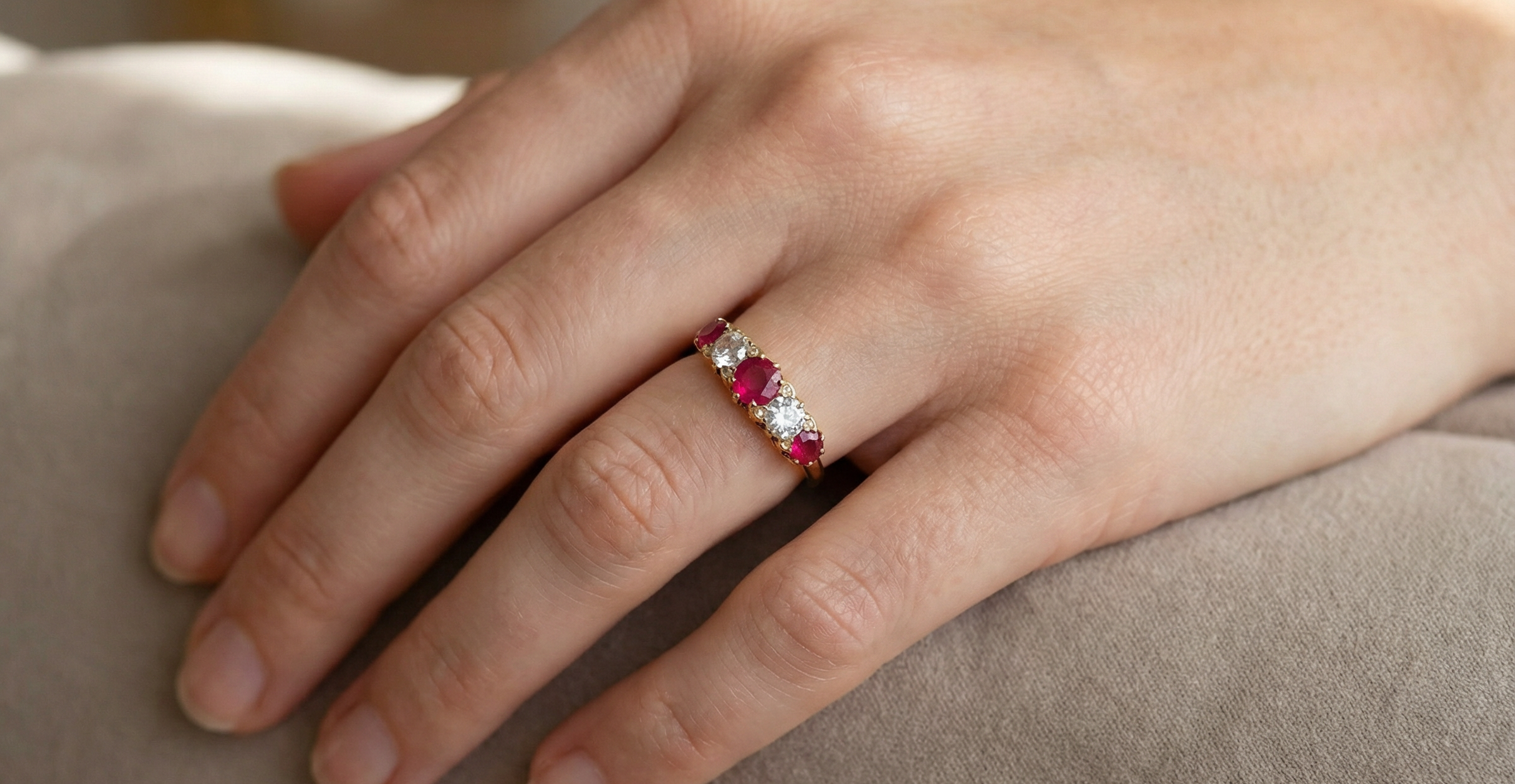 hand A superb Victorian ring, carved boat shaped head. Set with three fine rubies ,