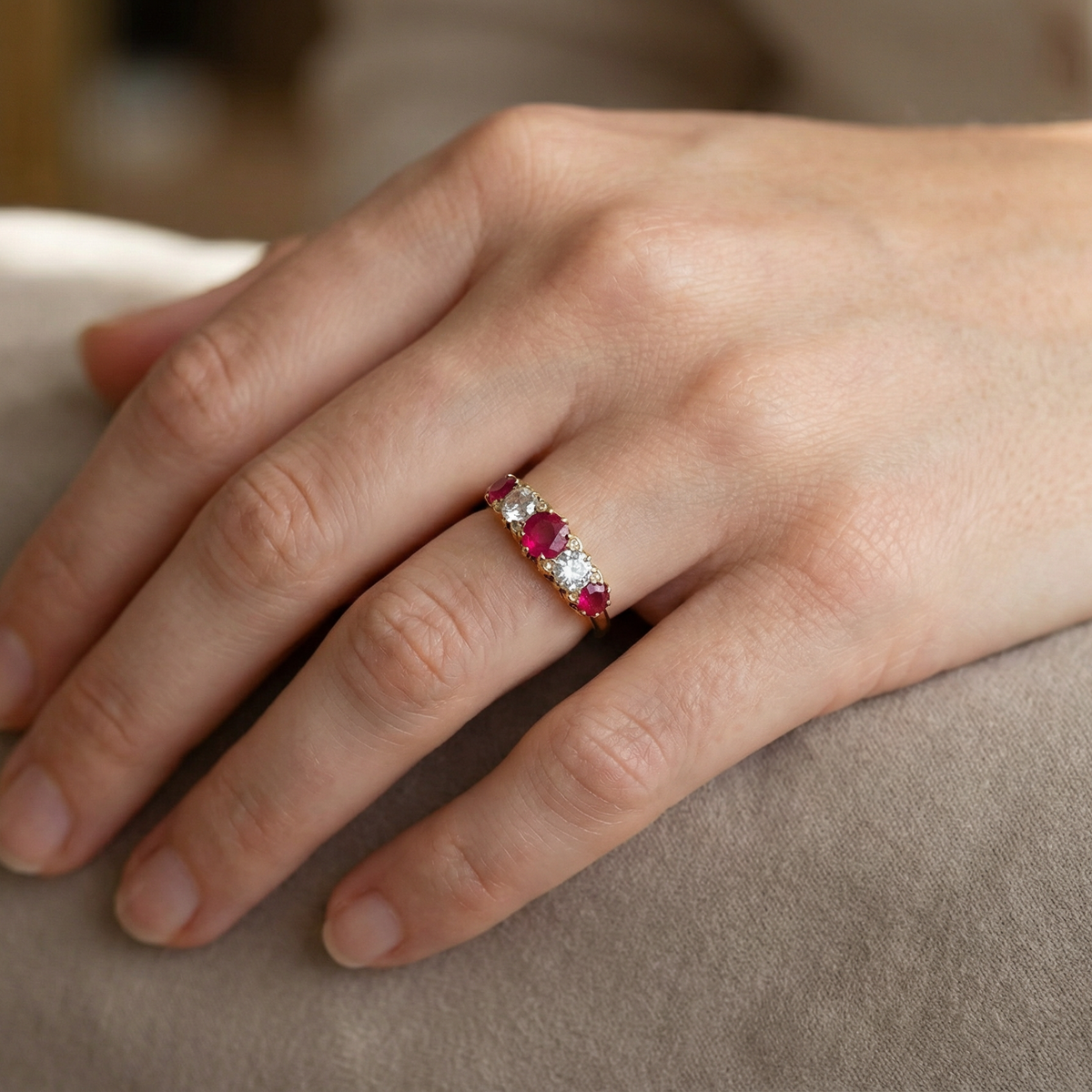 hand A superb Victorian ring, carved boat shaped head. Set with three fine rubies ,