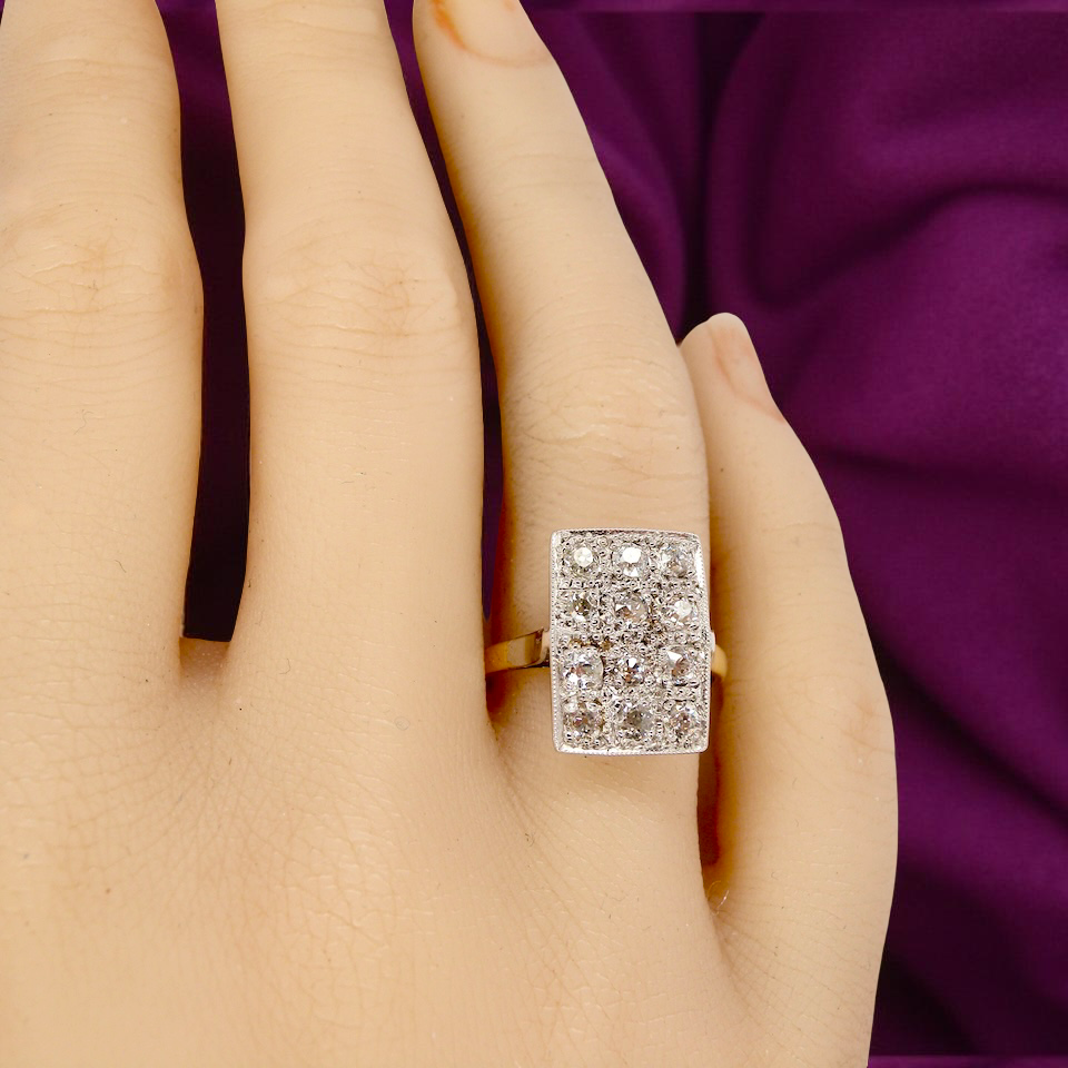 An Art Deco Diamond panel ring