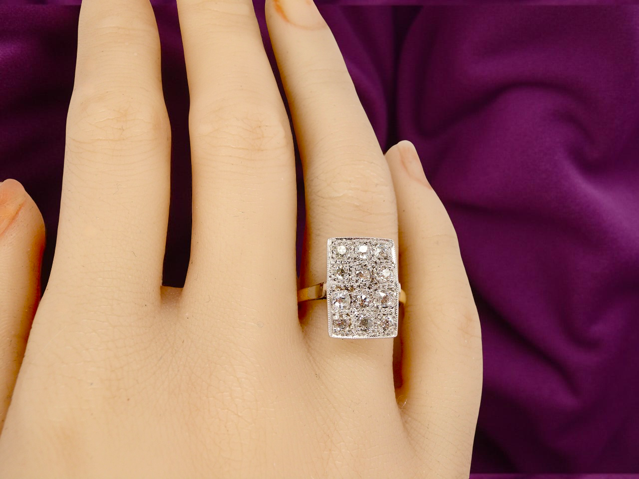 An Art Deco Diamond panel ring