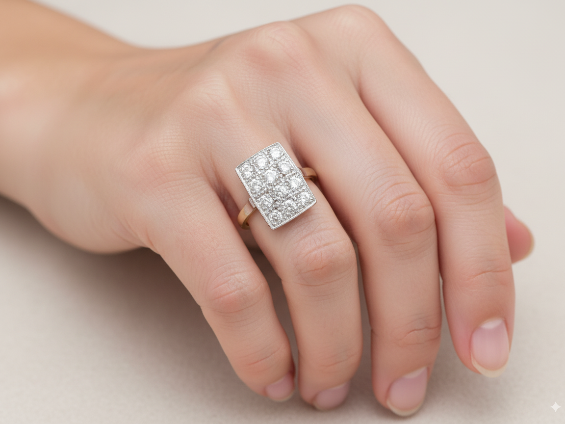 An Art Deco Diamond panel ring
