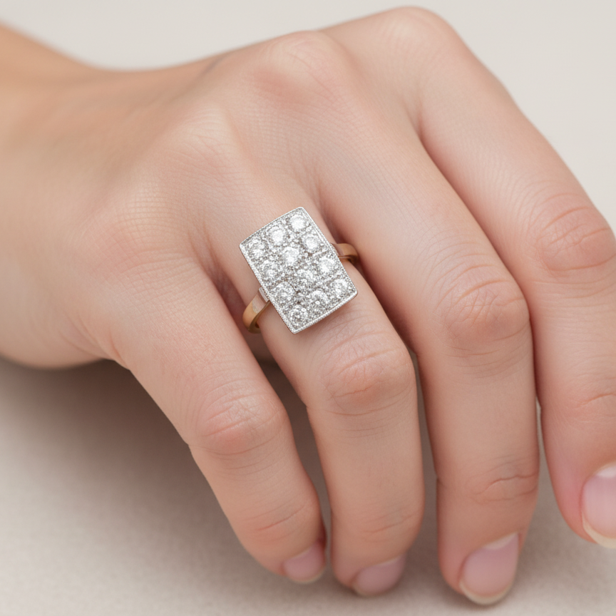 An Art Deco Diamond panel ring