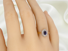 An sapphire & diamond cluster ring
