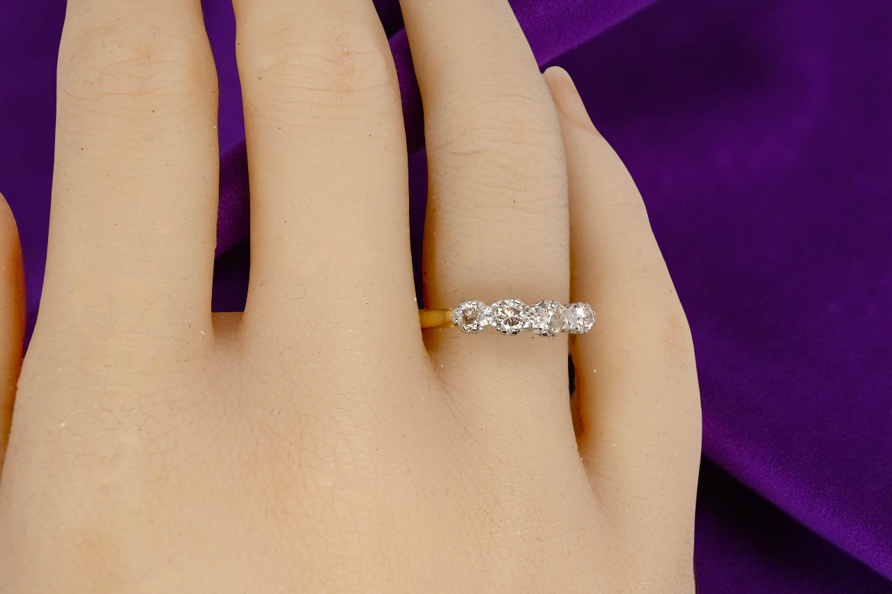 hand An early 20th century ring set with diamonds.