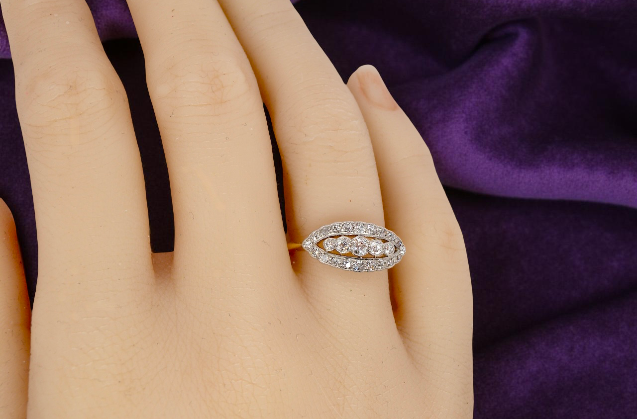 hand An enchanting diamond ring from the early part of the 20th century.