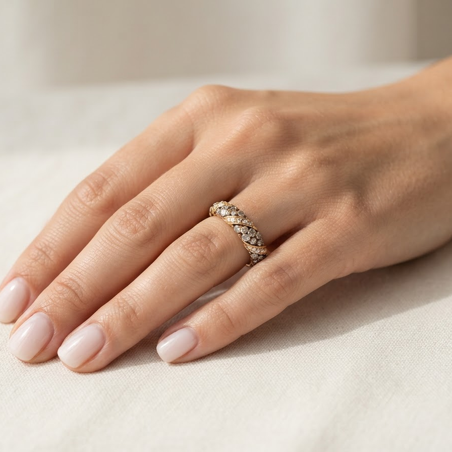 Hand From the Le Vian Collection a delightful 14 carat rose gold half hoop ring. 