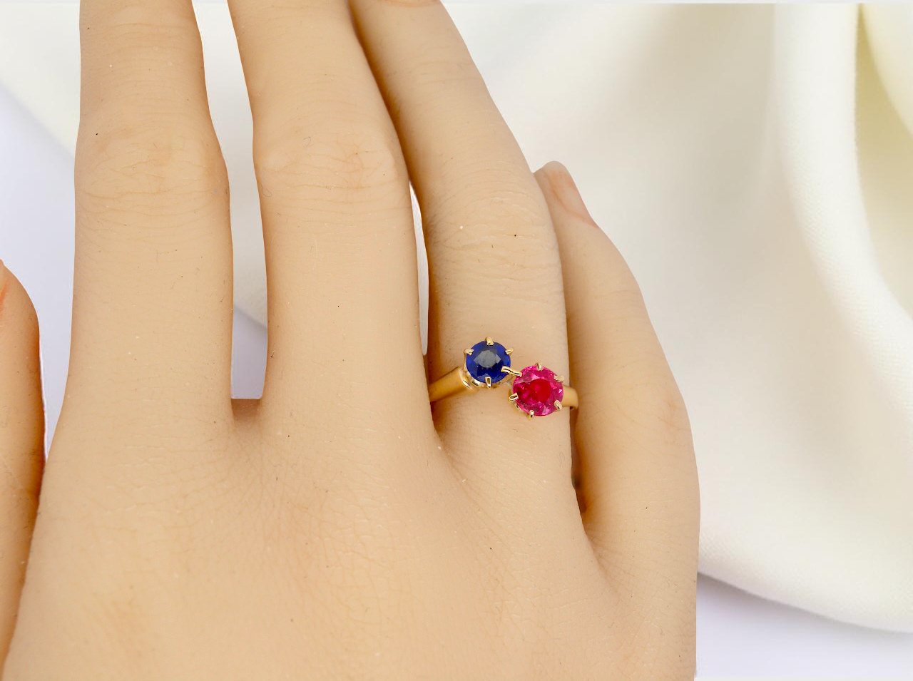 A Moi-et-Toi two stone sapphire ruby ring