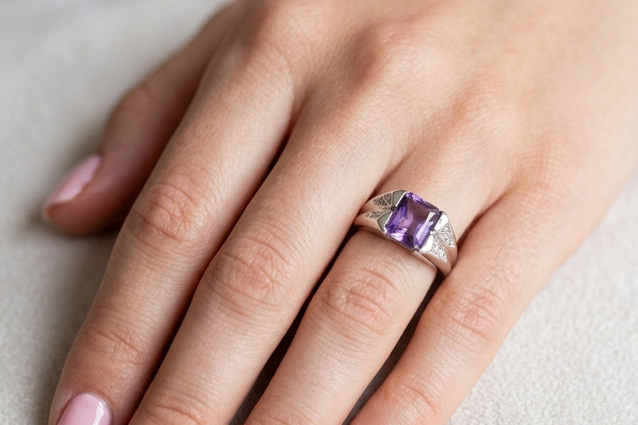 hand beautiful dress ring crafted in 14ct white gold (stamped 585), featuring a stunning rectangular-cut Tanzanite measuring approximately 9 x 7.5mm, estimated at 2.5 carats.