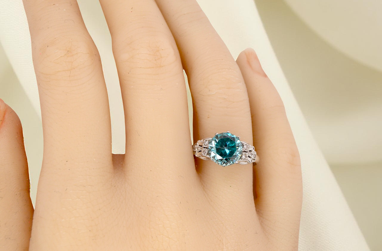 hand fine Art Deco ring that features a stunning natural blue zircon centre stone