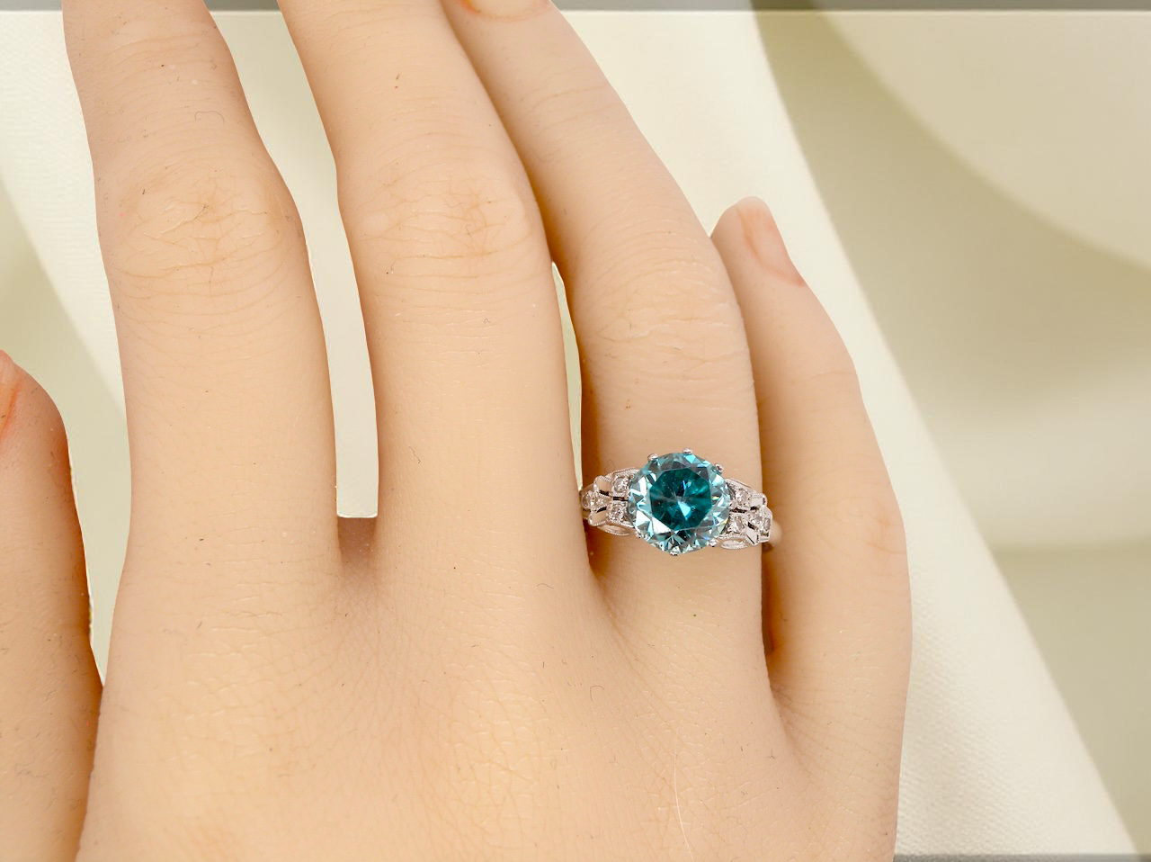 hand fine Art Deco ring that features a stunning natural blue zircon centre stone