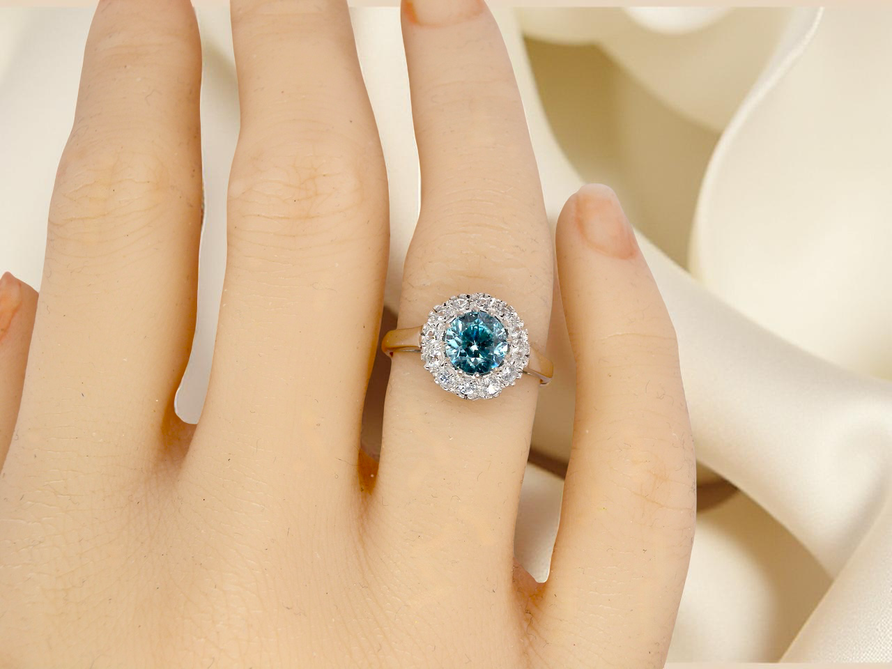 hand fine vintage cluster ring. The centre stone a natural blue zircon, 7mm diameter, bright sparkling refraction to the sky blue hue. 