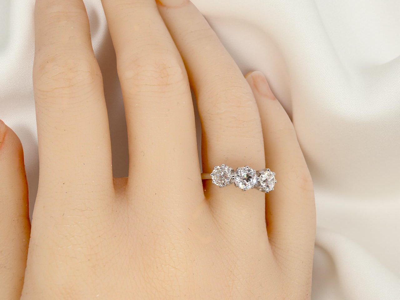 hand An ever-popular trilogy three-stone diamond ring, this beautiful example is in near-new condition