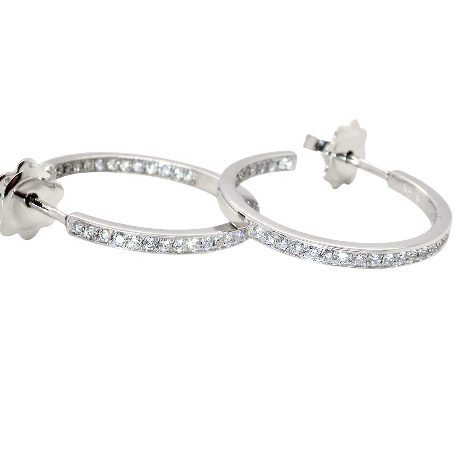 hoop earrings by Mappin & Webb,