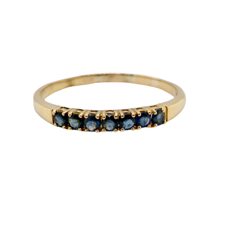 A sapphire half hoop eternity ring