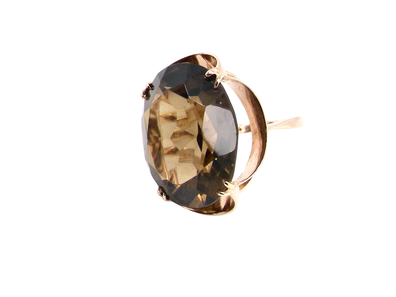 Gold ring with a large smoky quartz stone on a white background