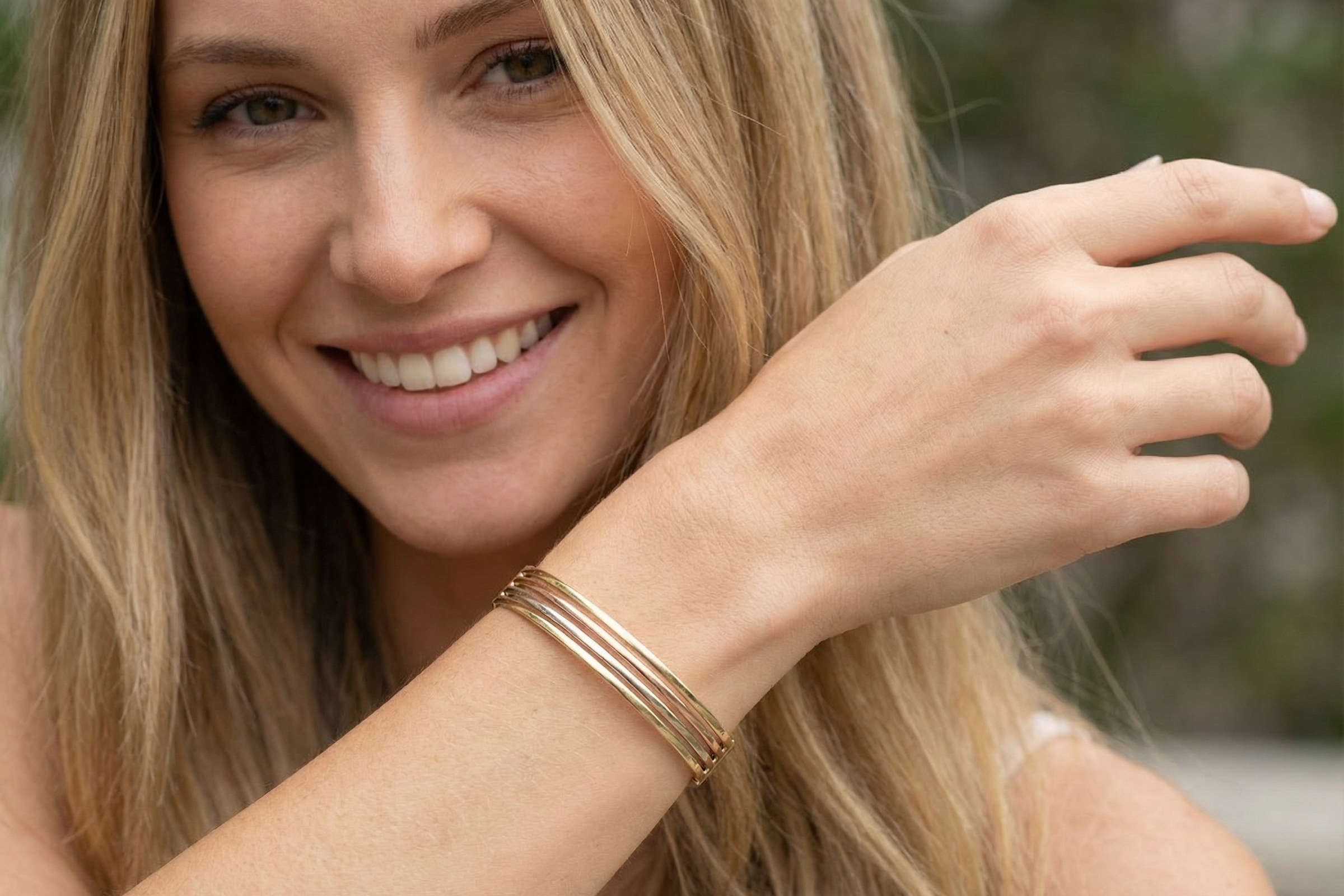 model A 9 carat gold bangle. Solid bands of rose, yellow and white gold