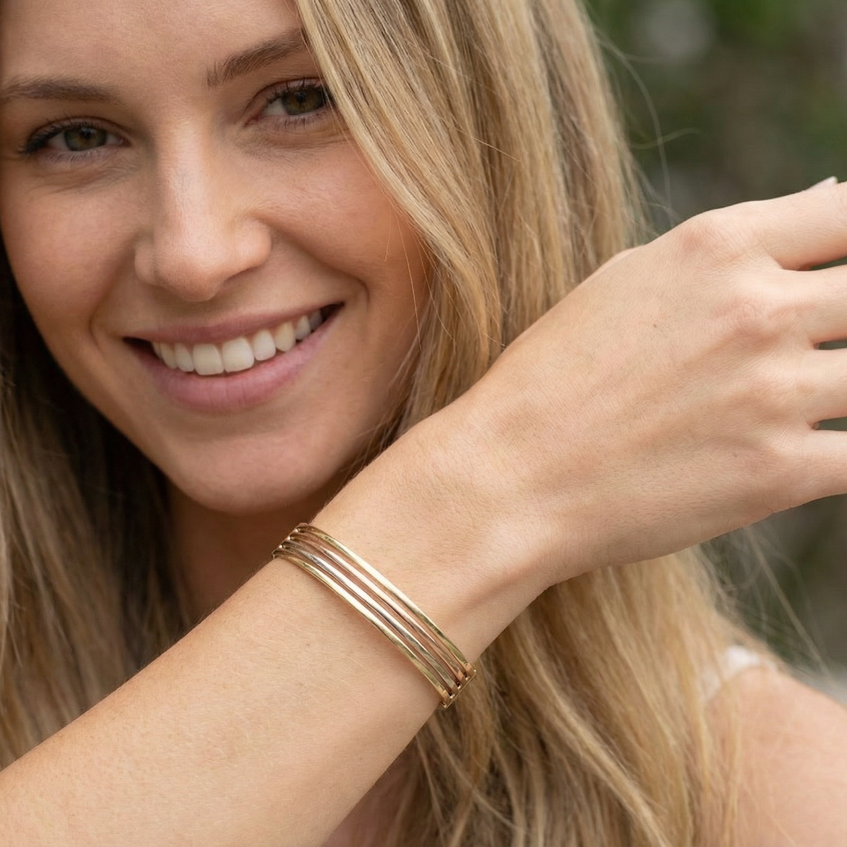 model A 9 carat gold bangle. Solid bands of rose, yellow and white gold