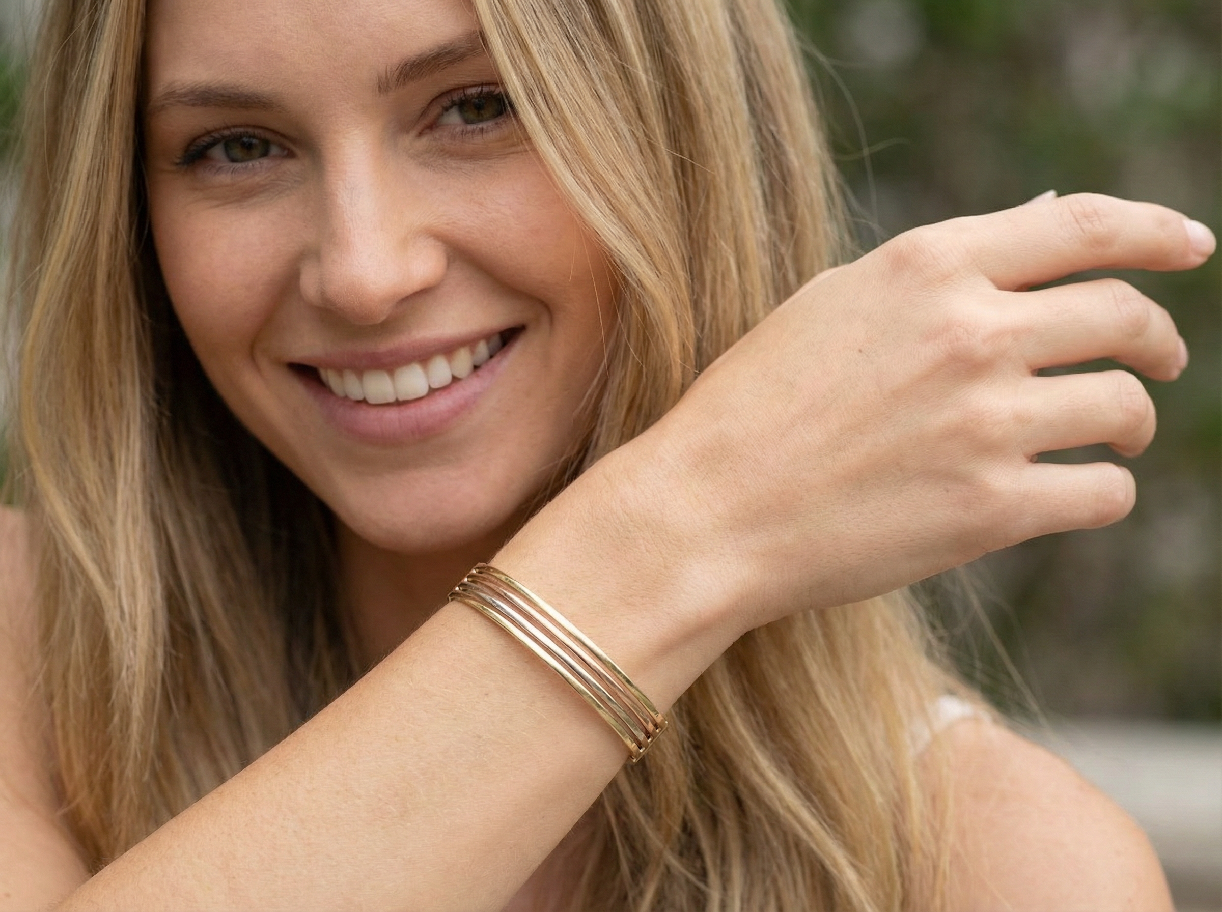 model A 9 carat gold bangle. Solid bands of rose, yellow and white gold