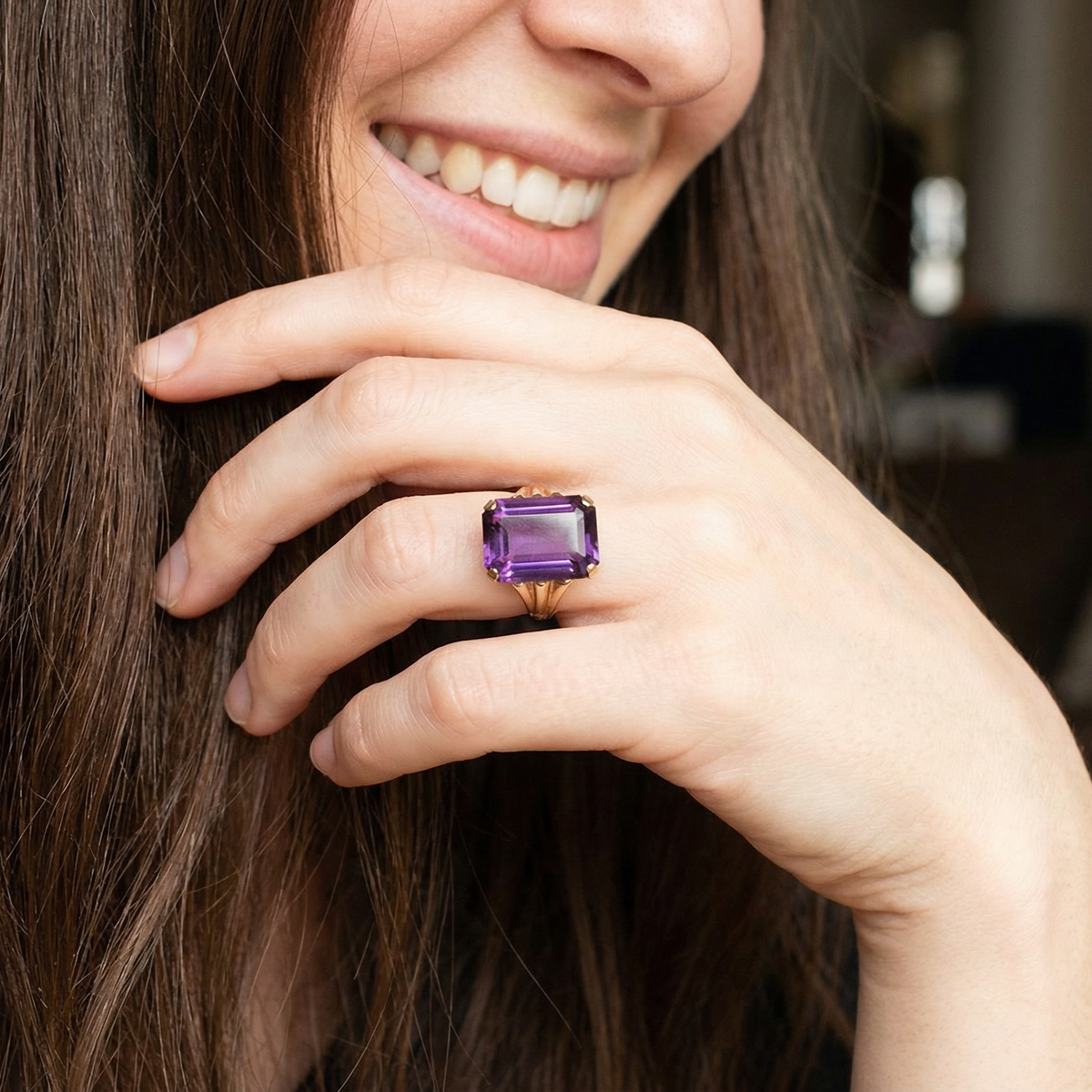 model A 9 carat gold* dress ring that is set with a substantial amethyst gemstone.