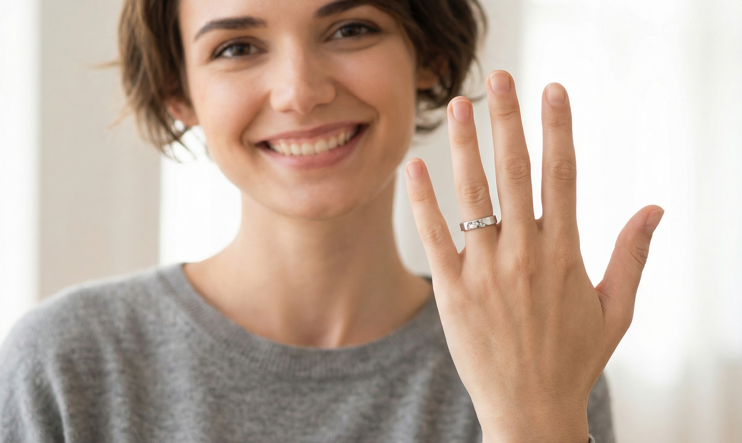 model A classic 9 carat white gold ring with a timeless wedding-band style, equally suited to wear as a simple diamond dress ring.