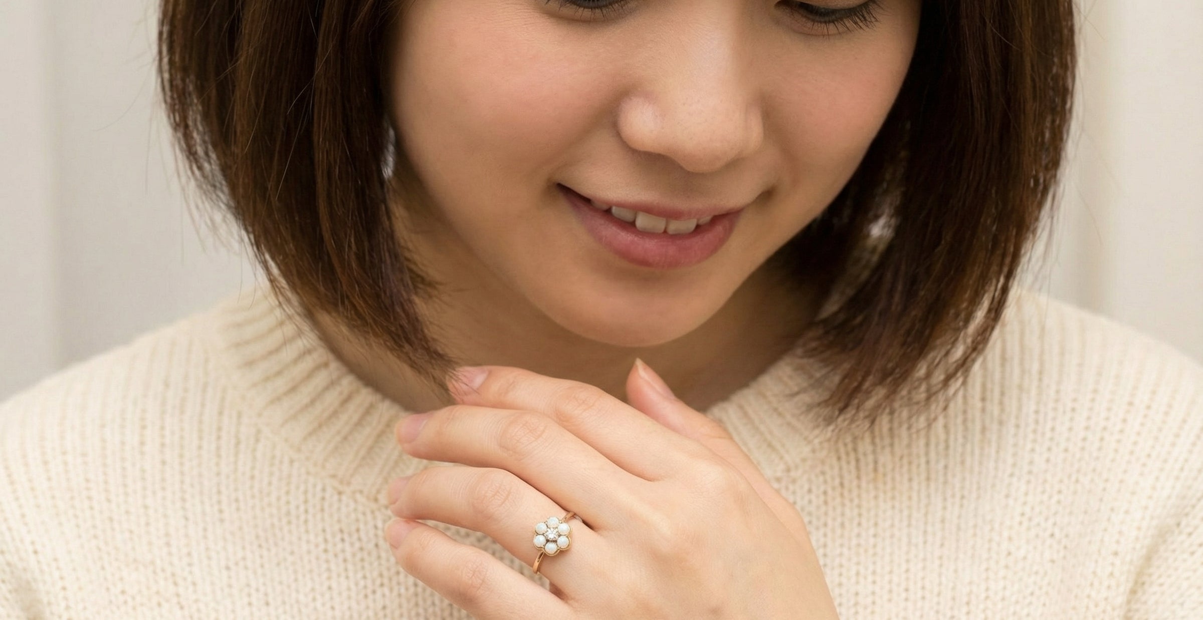 model A daisy cluster dress ring. Set with a small diamond centre stone, diameter 3mm (0.10 carats)