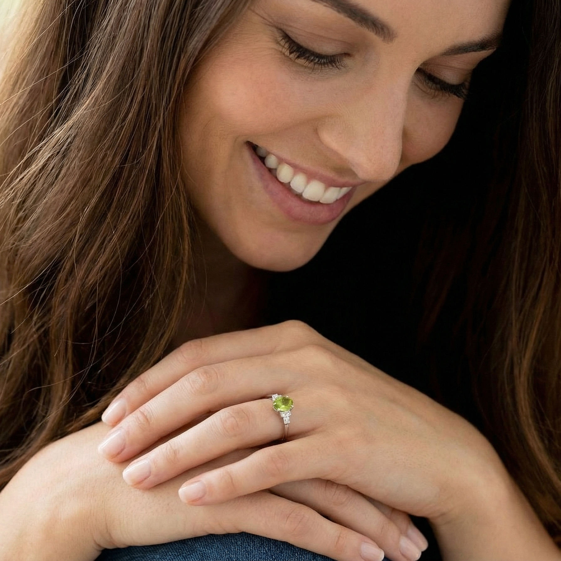 model A fine gem set ring featuring a vibrant lime-green oval faceted peridot,