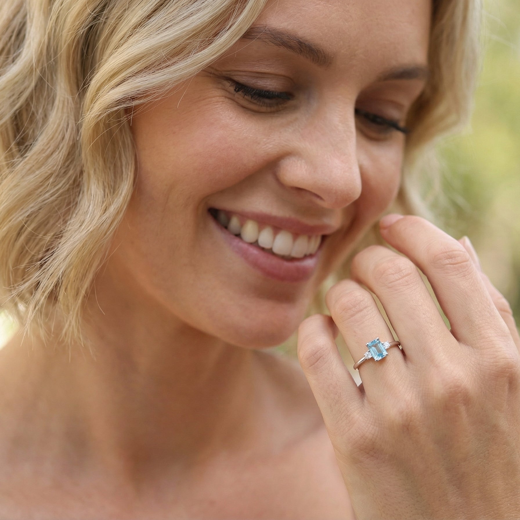 model A 9 carat white gold three stone ring. This ring is from our Heirloom Collection. This is when we take a stone from a pre-owned ring that is worn out, and reset it into a brand new setting.