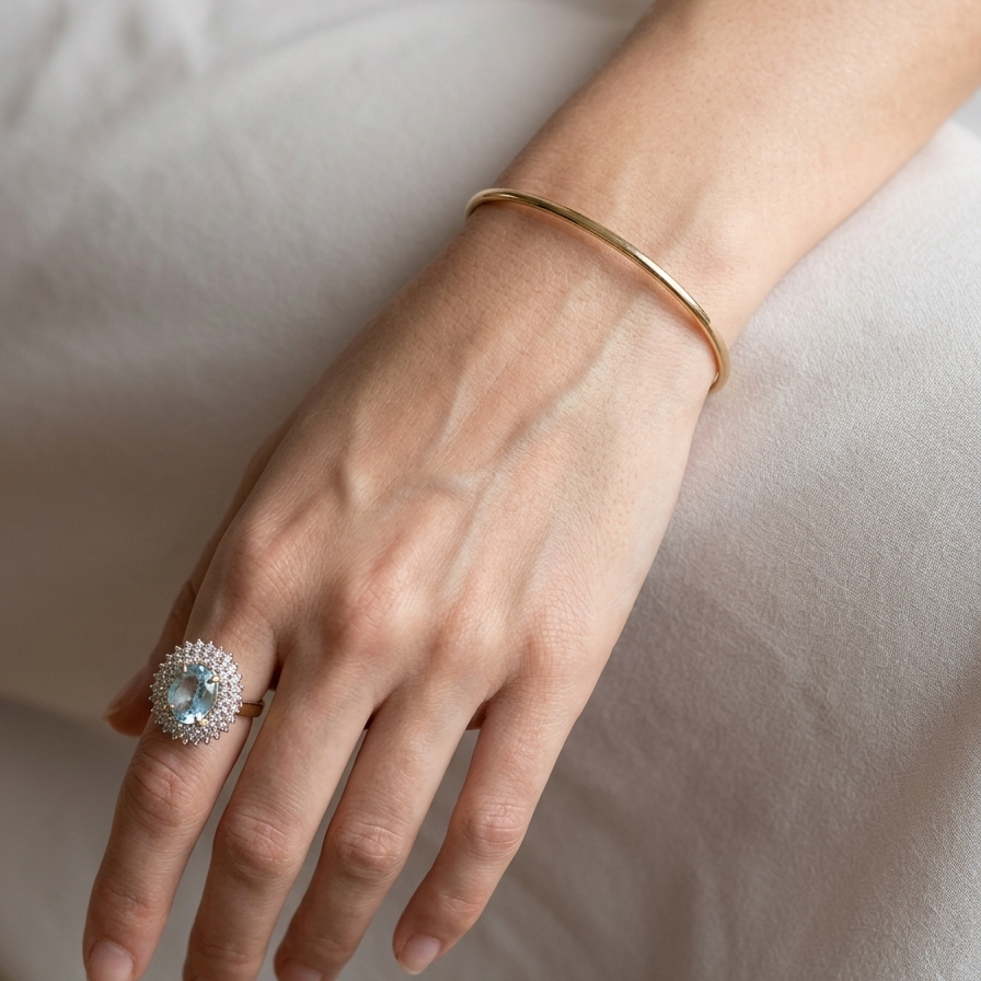 model A plain 9 carat gold, solid bangle (formally known as a slave bangle) Weighs 7.3 grams, round wire profile, just under 2mm.