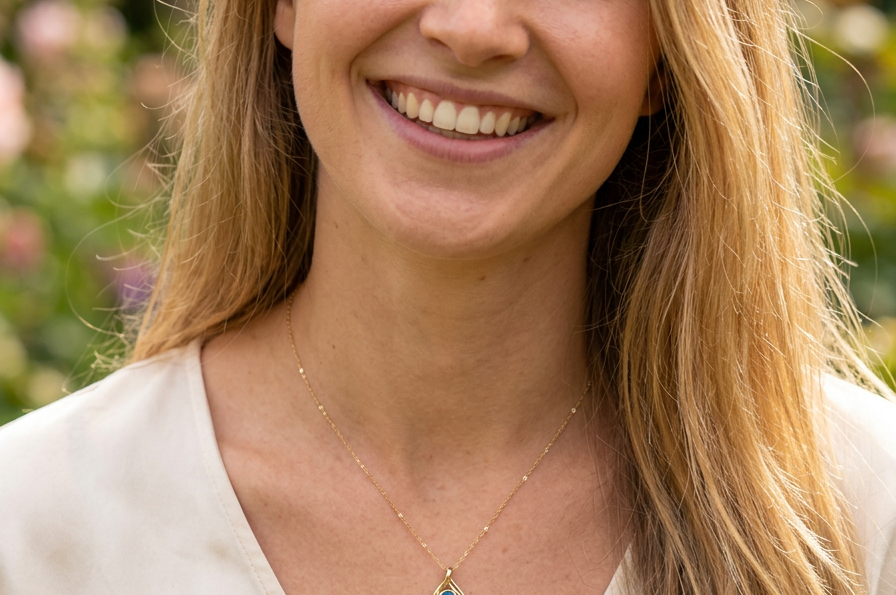 model A stunning pendant containing an oval shaped black opal