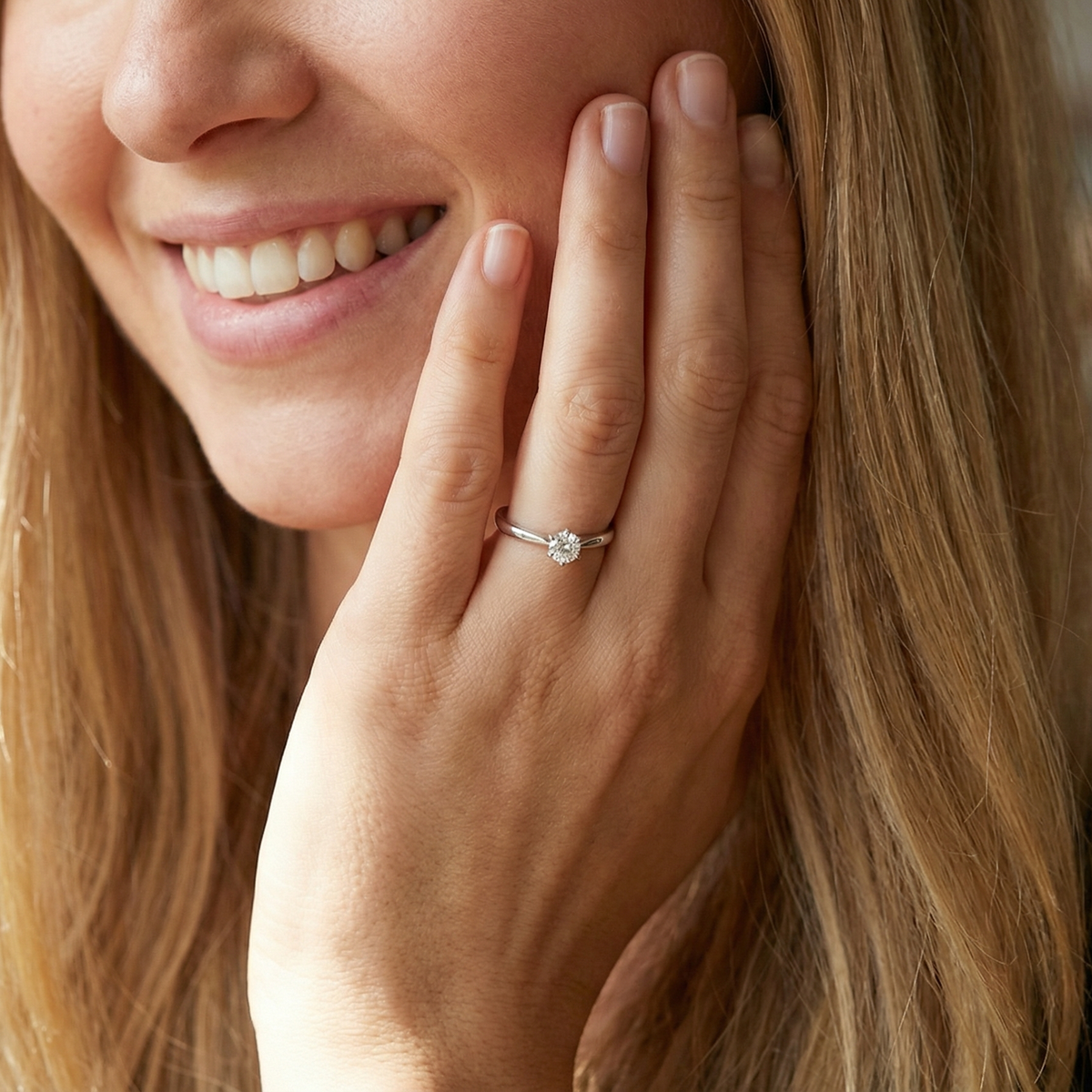 model A timeless and elegant solitaire ring set with a brilliant-cut white diamond
