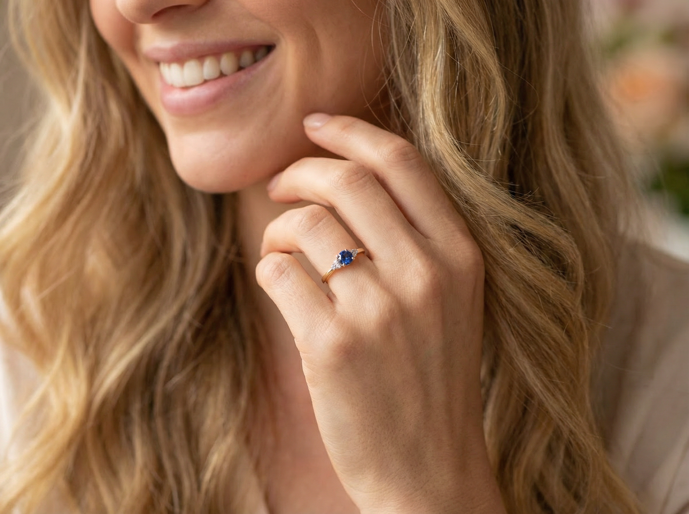 model An 18 carat gold ring set with a vibrant blue sapphire,