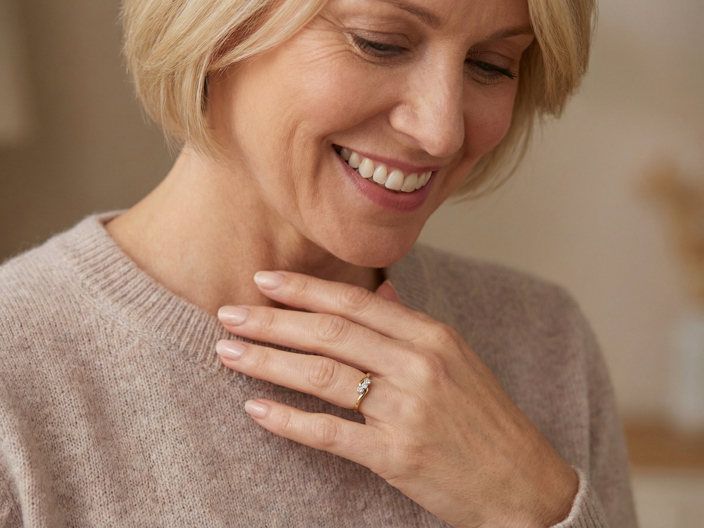 model An 18 carat yellow gold three stone ring, cross over style, and set with brilliant cut white diamonds.
Centre stone 3mm (0.10 carats)