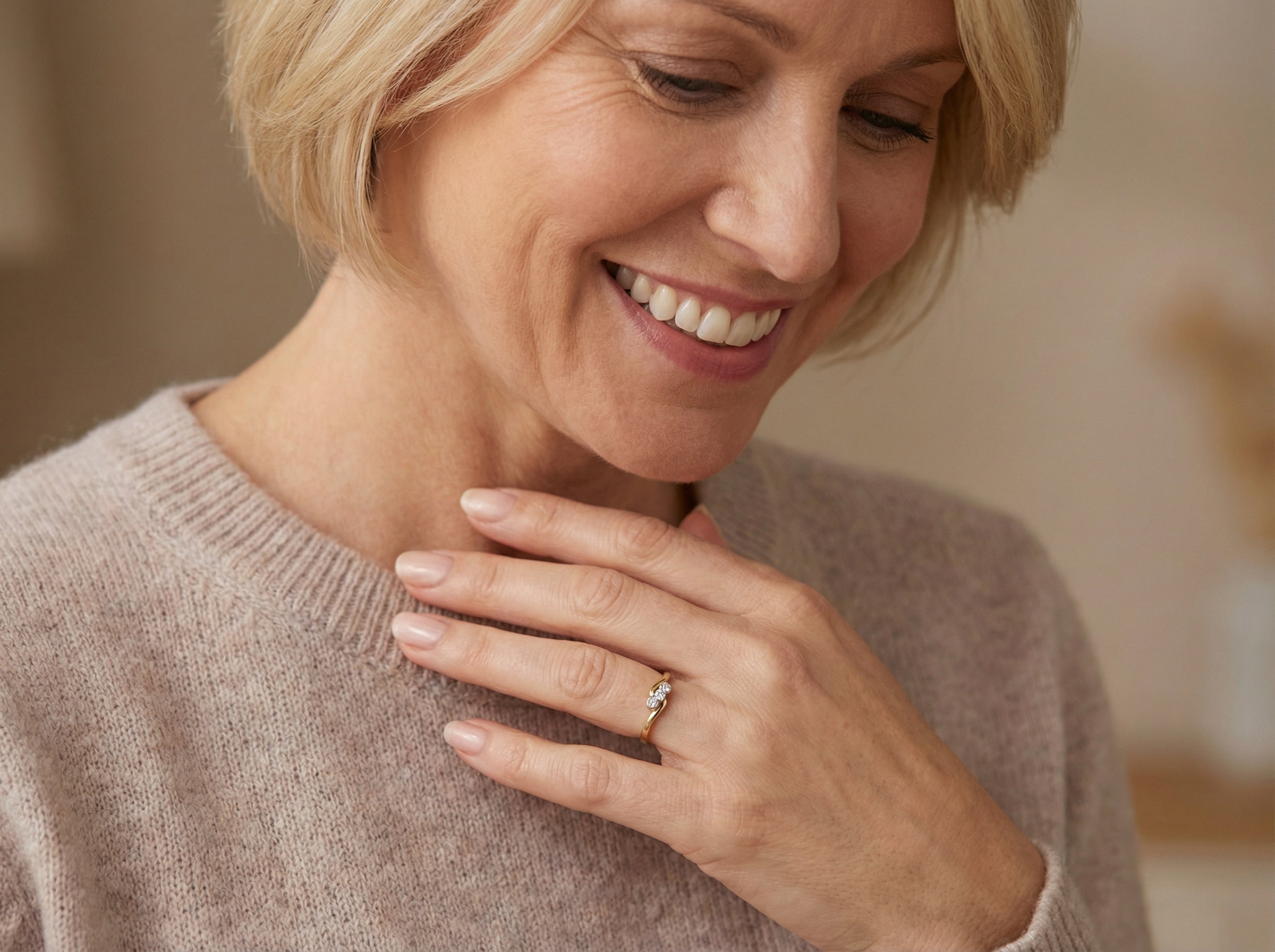 model An 18 carat yellow gold three stone ring, cross over style, and set with brilliant cut white diamonds.
Centre stone 3mm (0.10 carats)