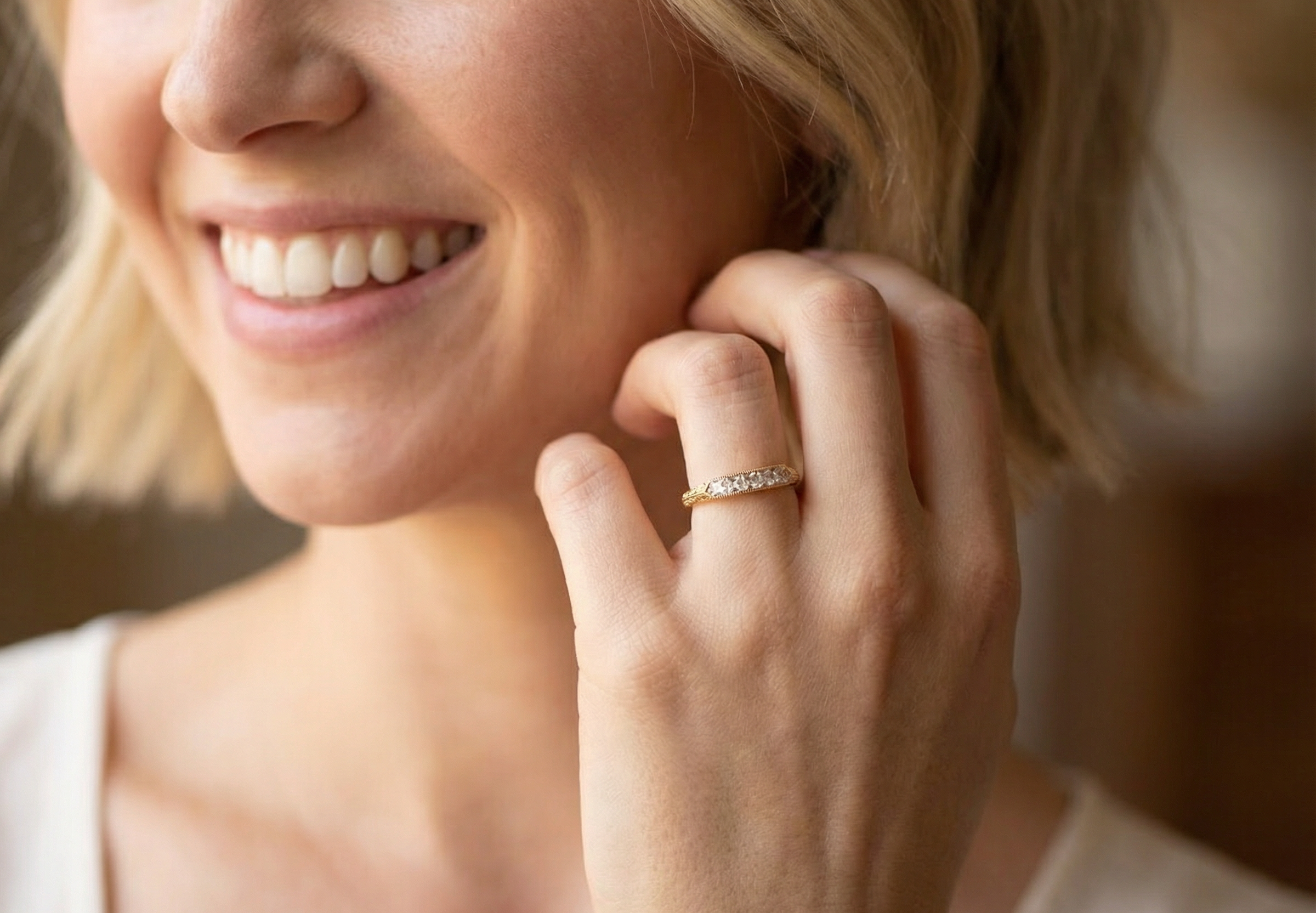 model An attractive half hoop diamond eternity ring. Set with six step cut white diamonds, tbhat sit side by side, the colour estimated at H-i, clarity Si.