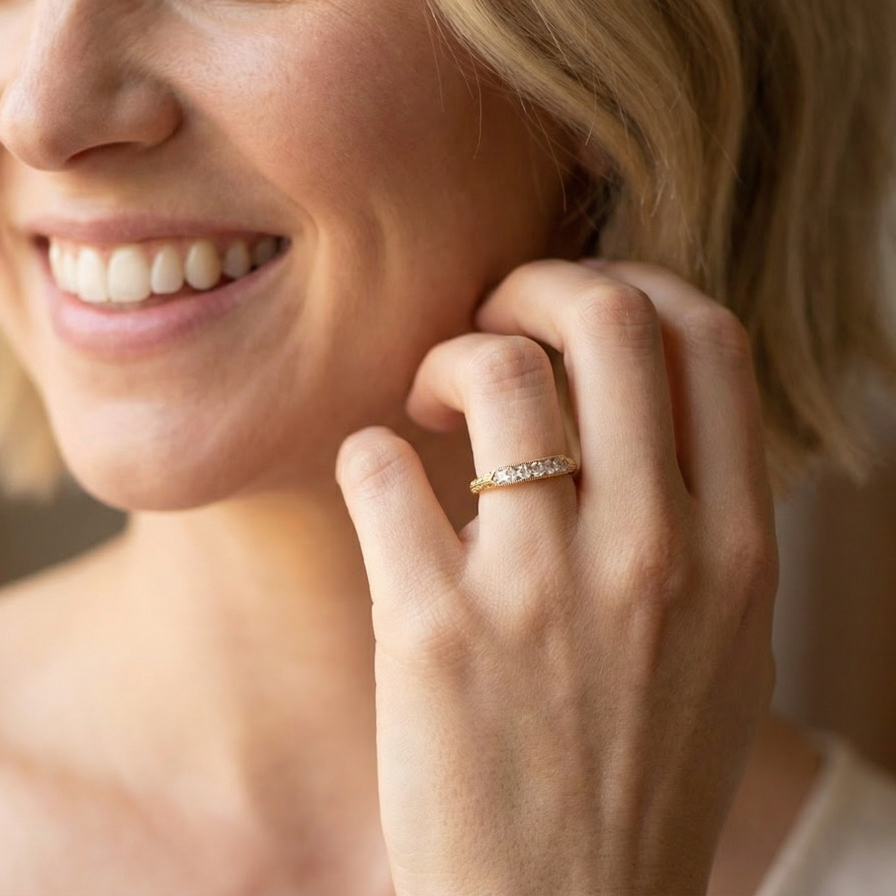 model An attractive half hoop diamond eternity ring. Set with six step cut white diamonds, tbhat sit side by side, the colour estimated at H-i, clarity Si.