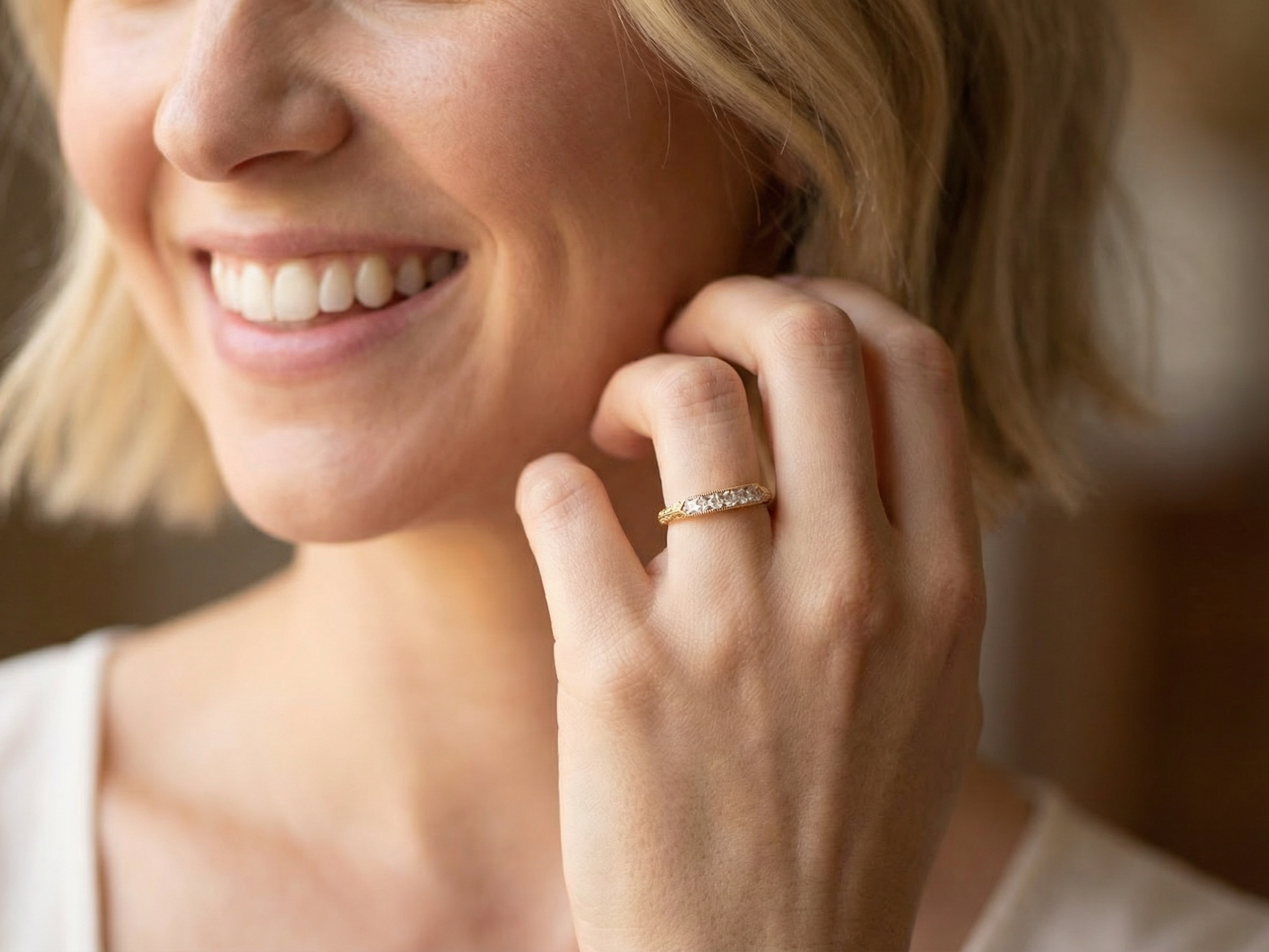 model An attractive half hoop diamond eternity ring. Set with six step cut white diamonds, tbhat sit side by side, the colour estimated at H-i, clarity Si.