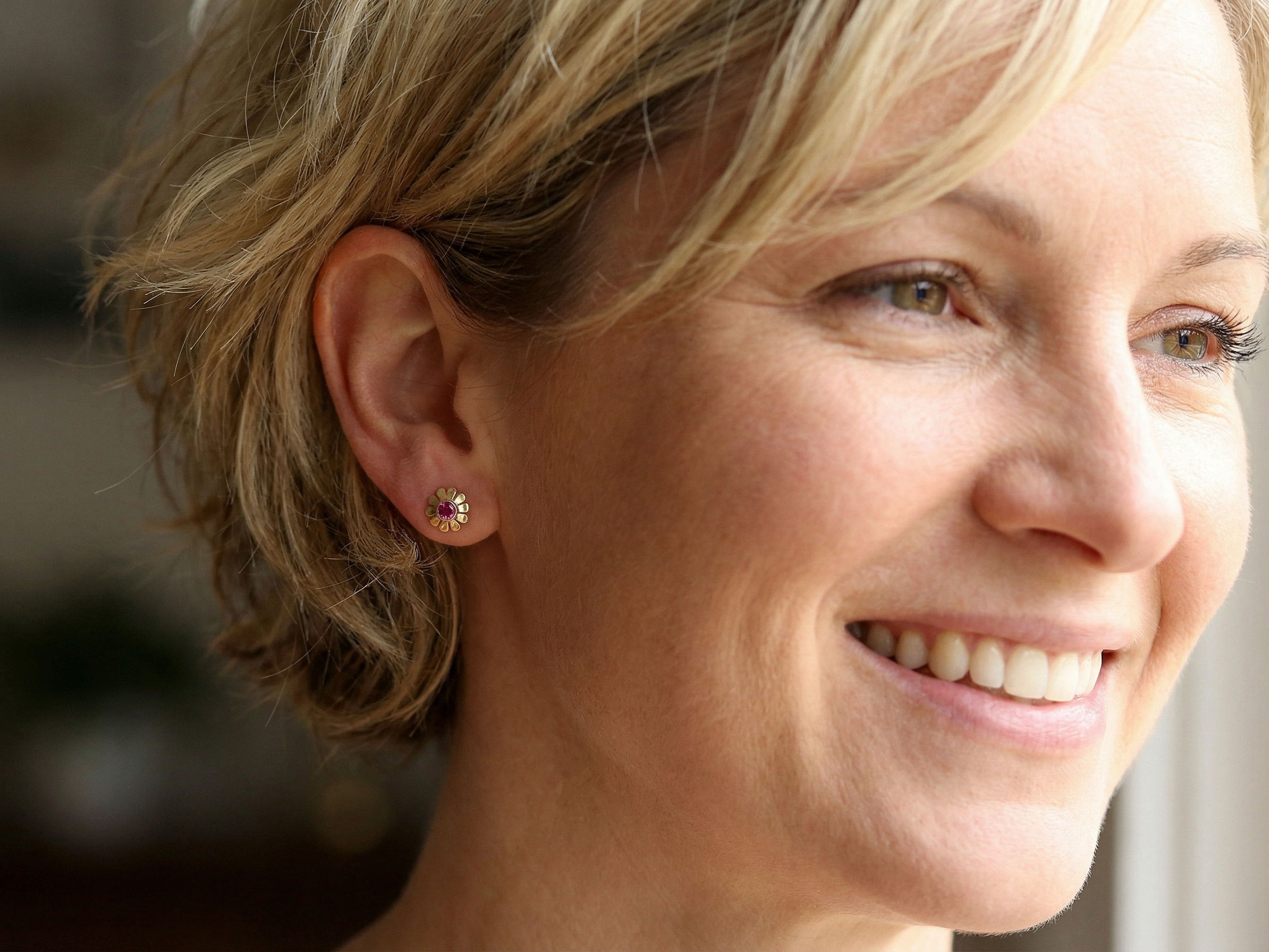 model An exceptional pair of ruby earrings.Each earring is centred with a cushion-shaped ruby measuring approximately 3.6–3.8mm,