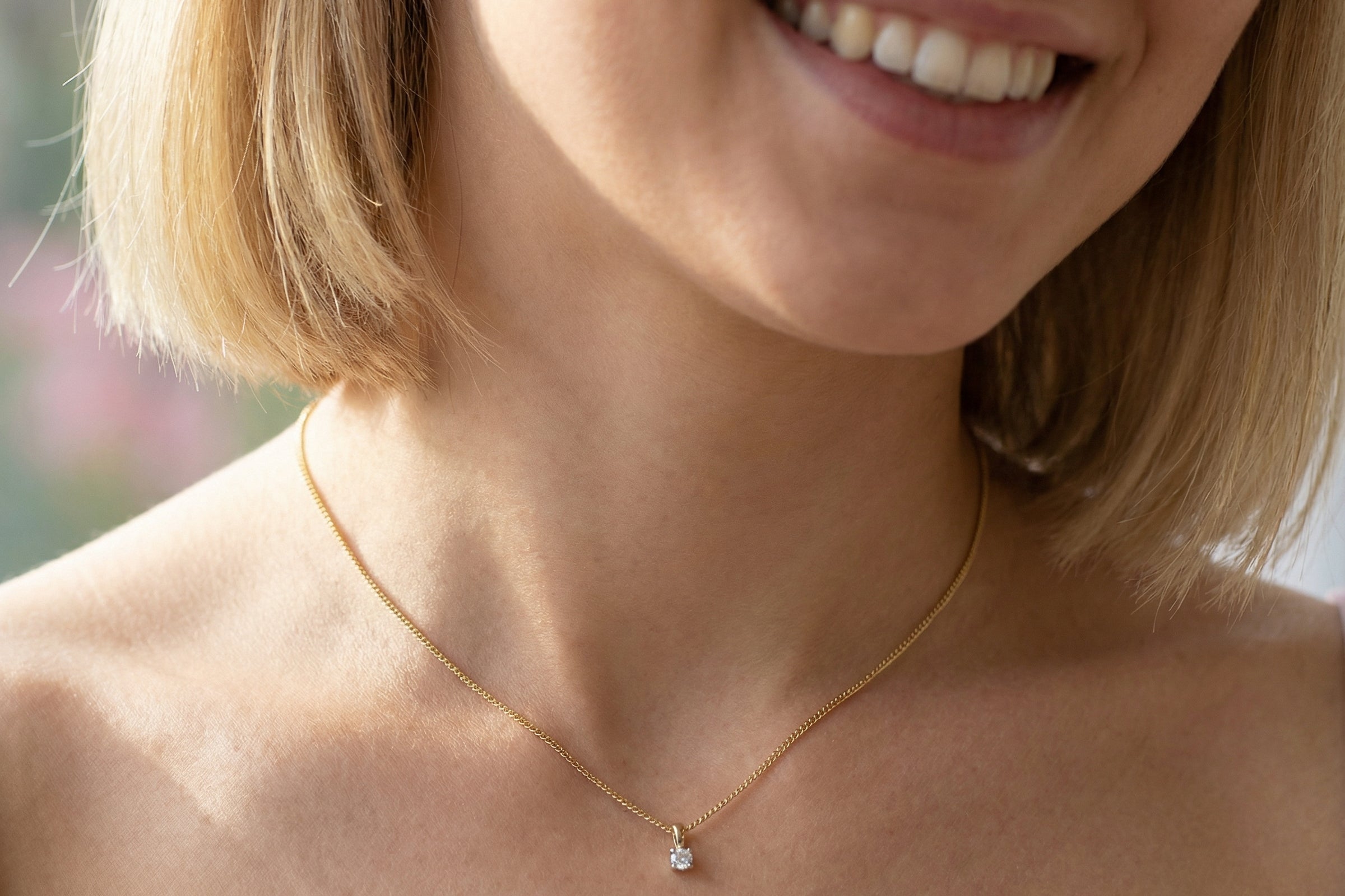 model Elegant and timeless, this solitaire diamond pendant showcases a beautifully cut 4mm round brilliant diamond, weighing 0.25 carats. The diamond features a bright H–J colour and Si clarity