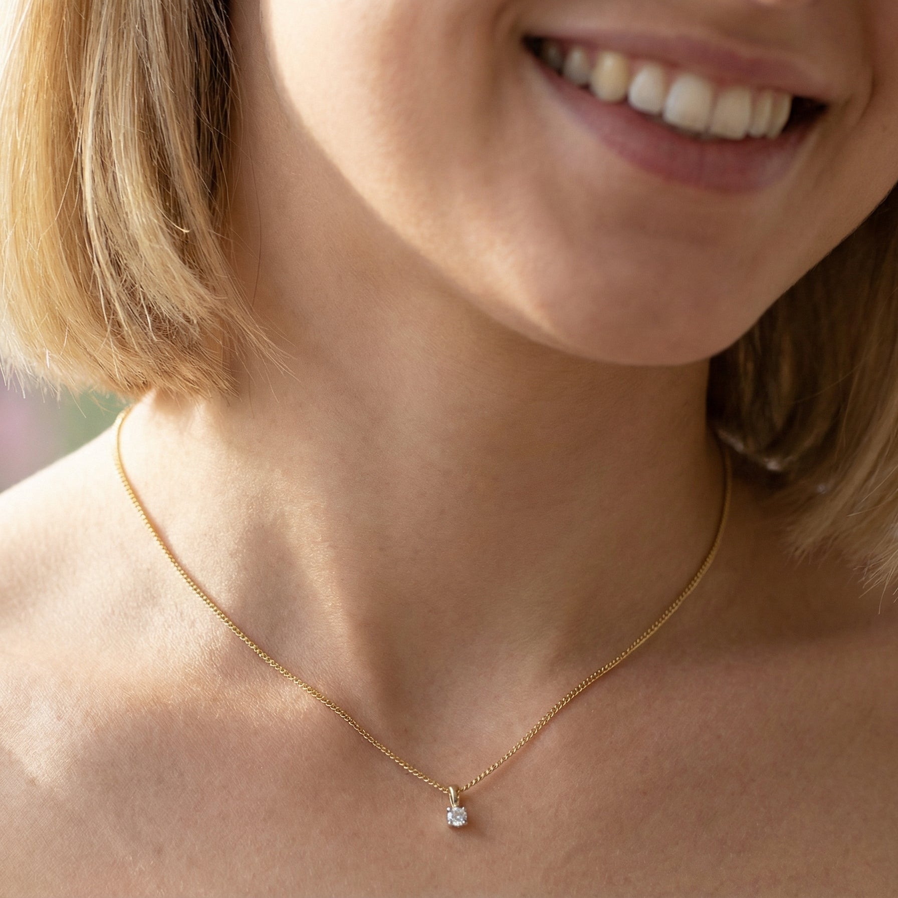 model Elegant and timeless, this solitaire diamond pendant showcases a beautifully cut 4mm round brilliant diamond, weighing 0.25 carats. The diamond features a bright H–J colour and Si clarity