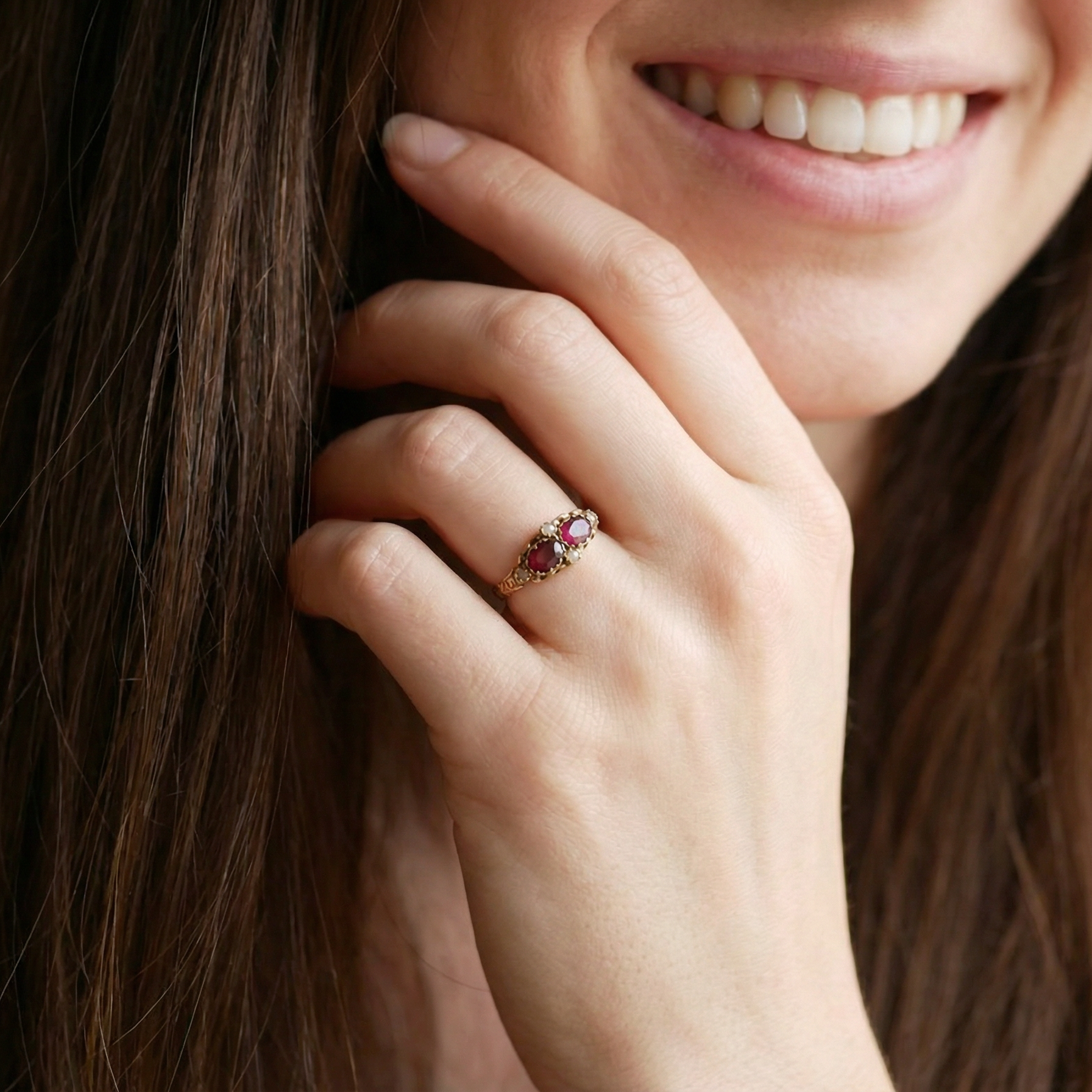 model Victorian dress ring, beautifully set with two matching oval-cut garnets