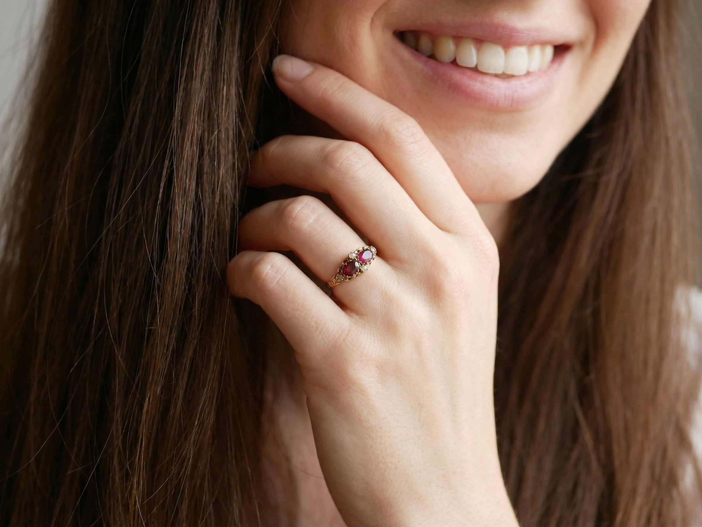 model Victorian dress ring, beautifully set with two matching oval-cut garnets