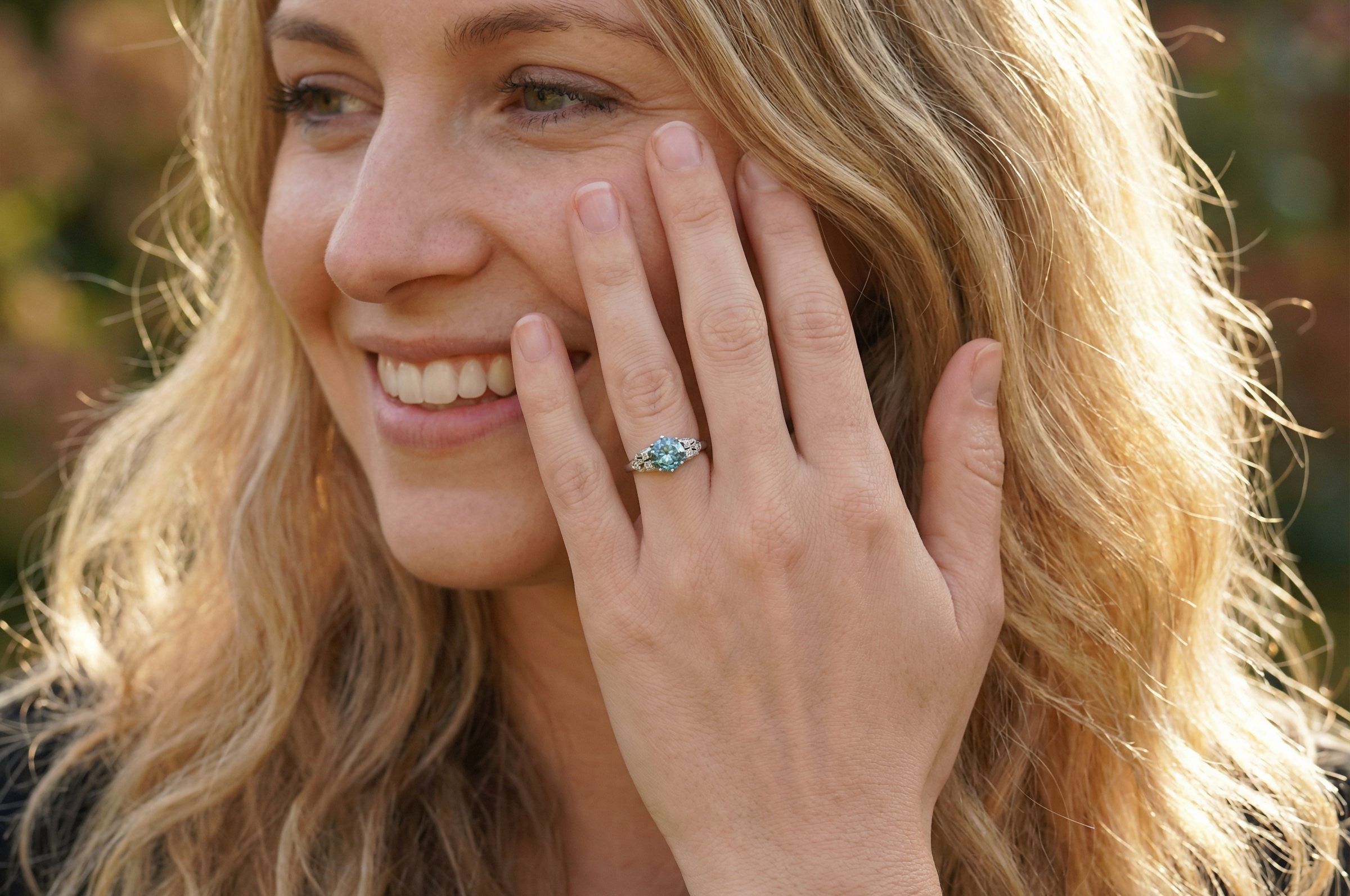 model fine Art Deco ring that features a stunning natural blue zircon centre stone
