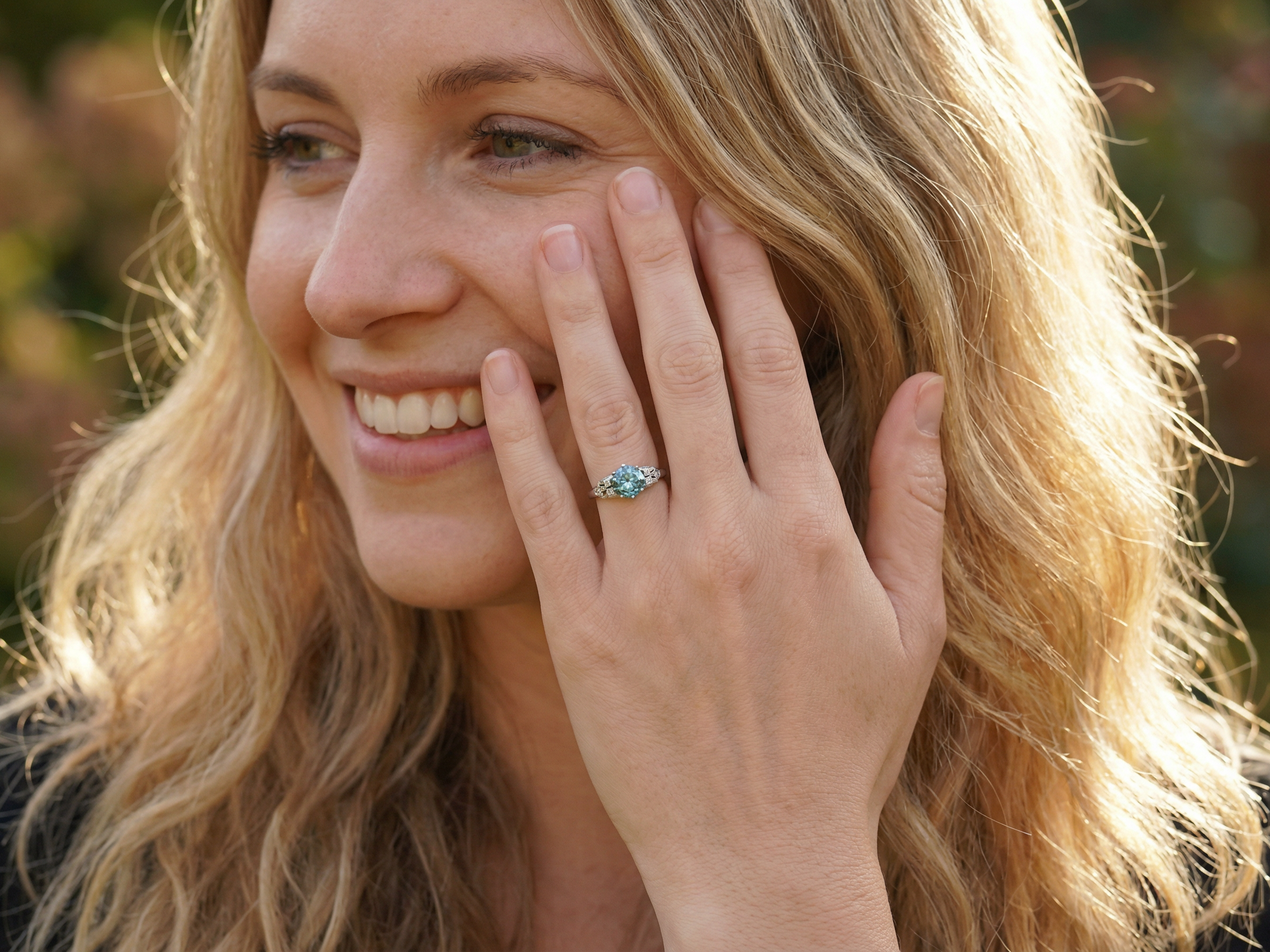 model fine Art Deco ring that features a stunning natural blue zircon centre stone