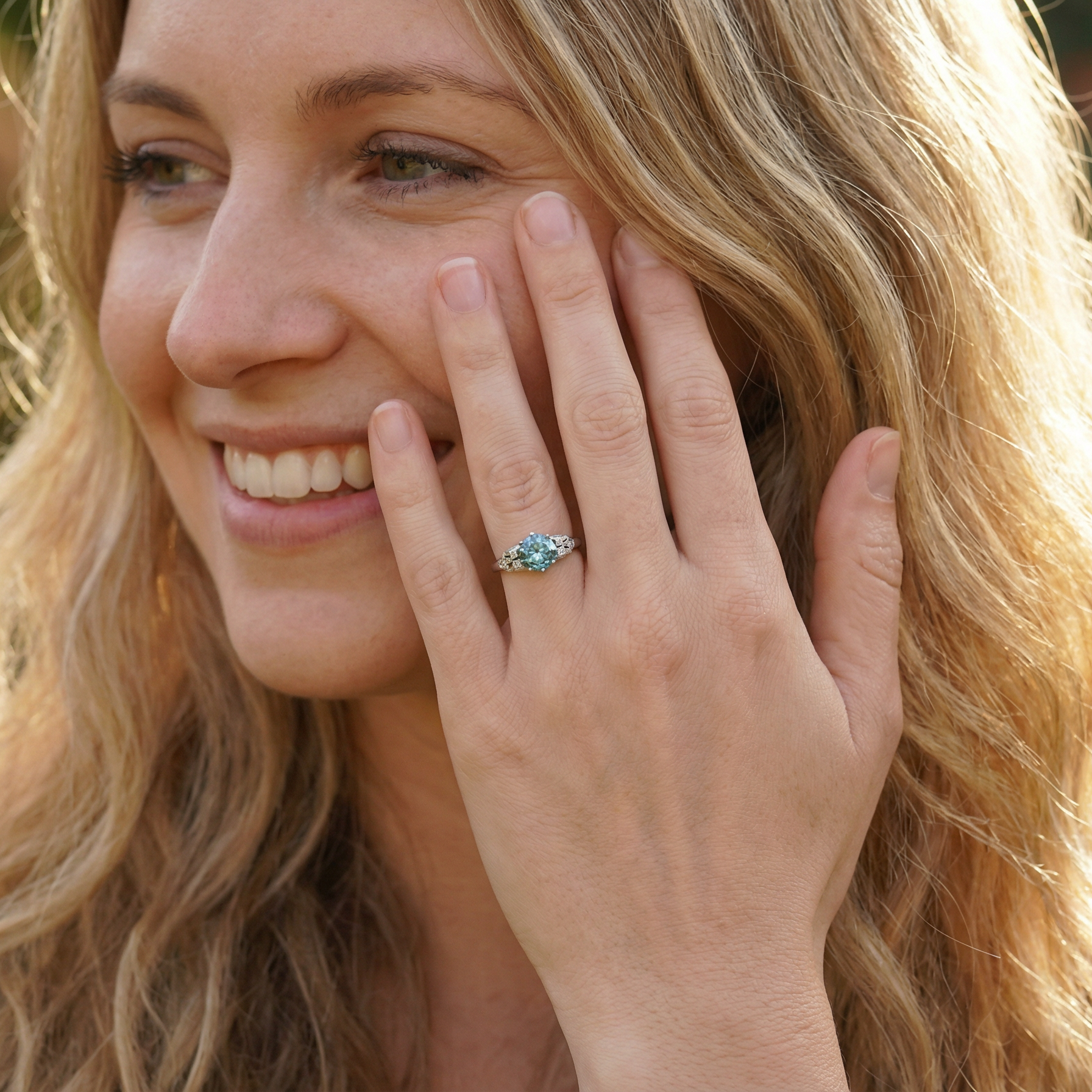model fine Art Deco ring that features a stunning natural blue zircon centre stone
