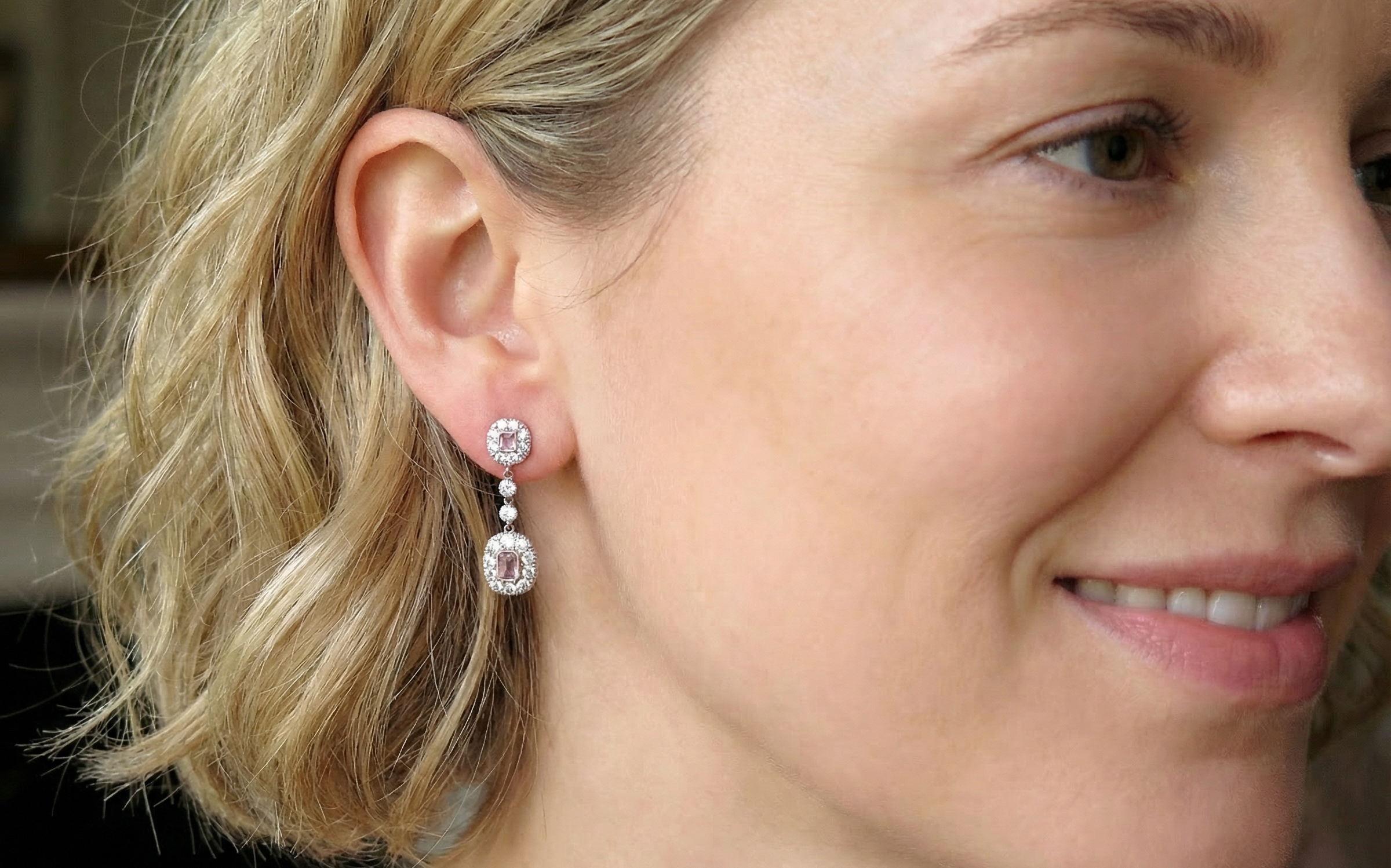 model pair of drop earrings from. the glamour era of the Edwardian era.