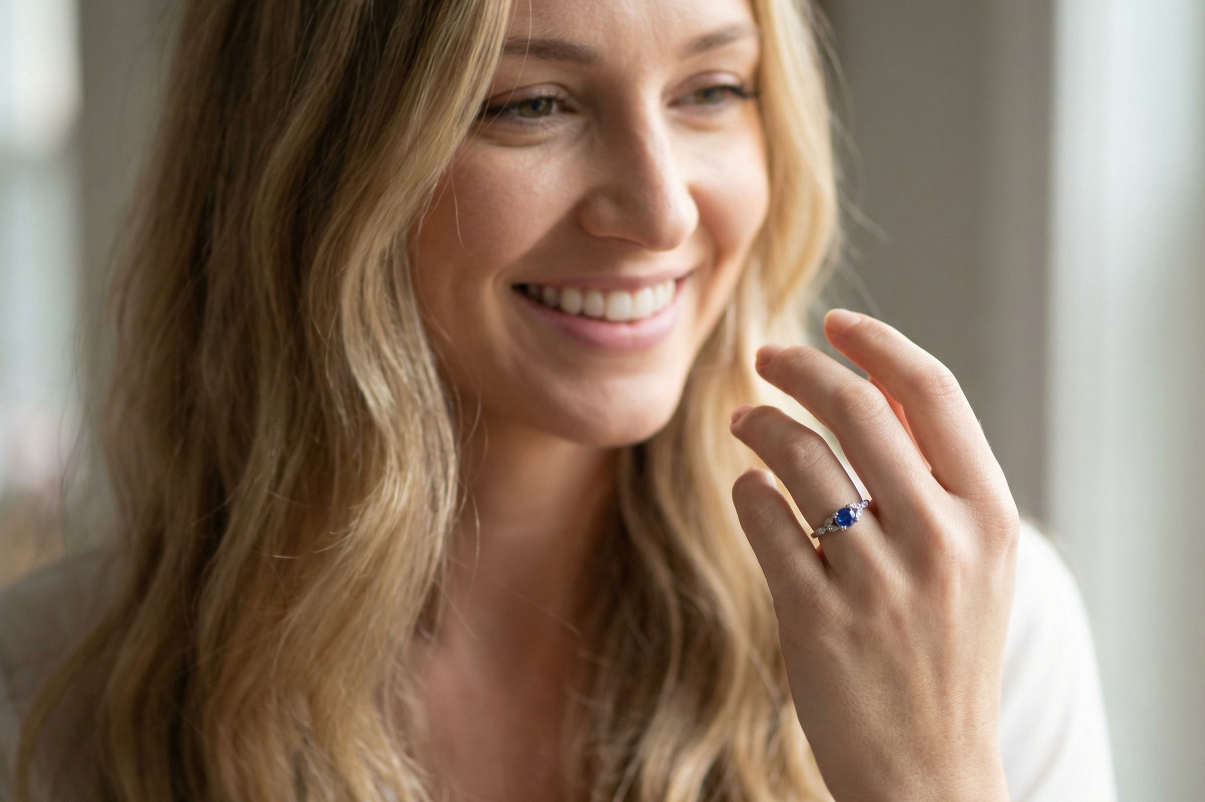model vintage style ring that features a round sapphire,