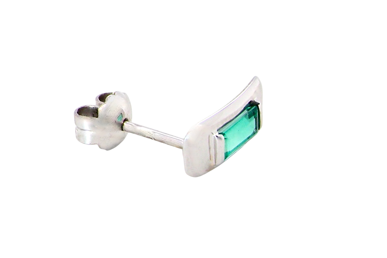 modern pair of earring. emerald is rectangular, step cut,