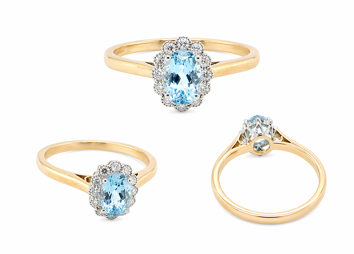 multi An 18 carat gold cluster ring. Set to the centre a lovely ice blue aquamarine 6x4mm, claw set.