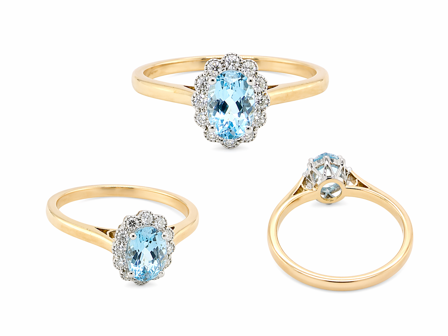 multi An 18 carat gold cluster ring. Set to the centre a lovely ice blue aquamarine 6x4mm, claw set.